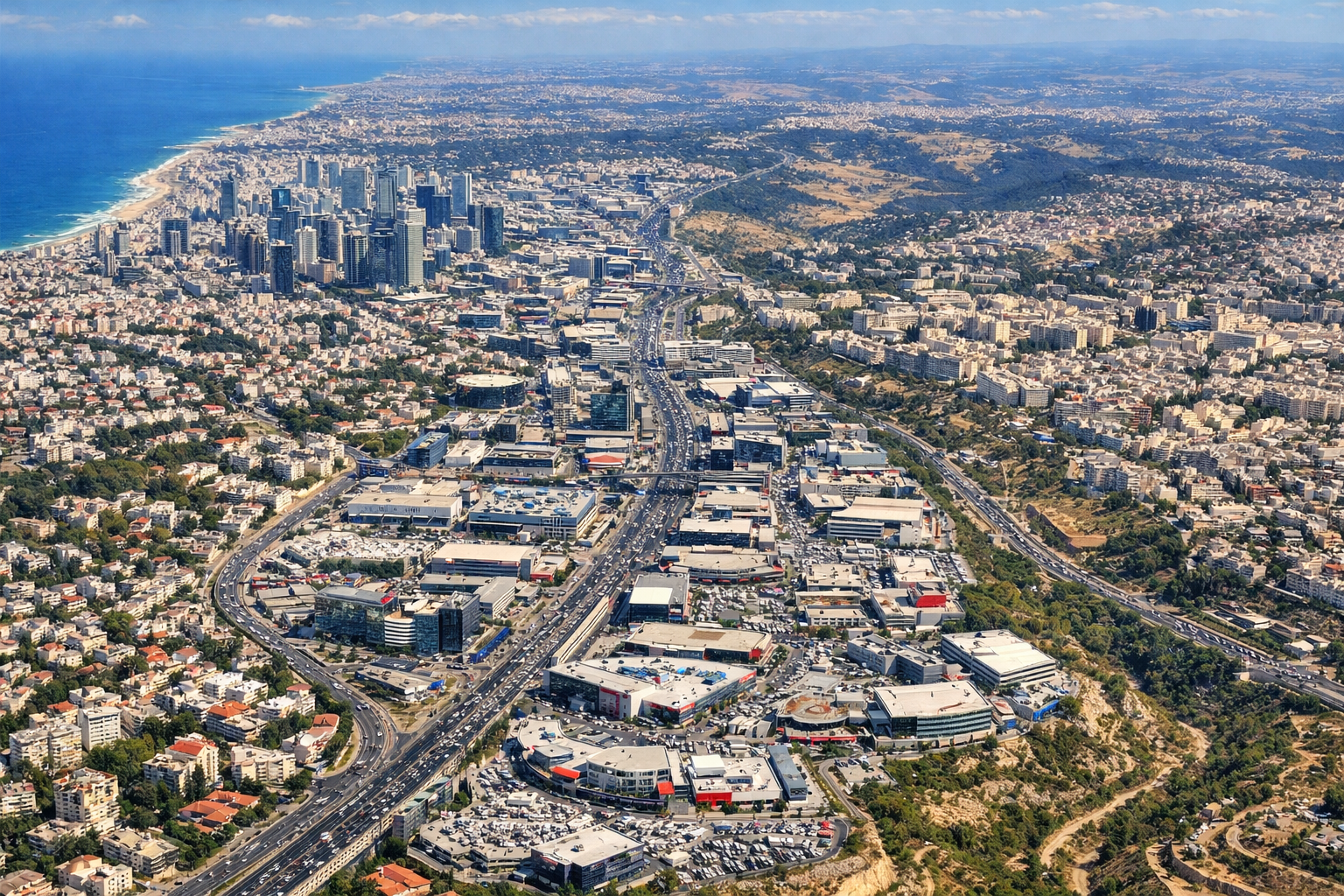 Aerial view of competitive Central Israel cities including Tel Aviv.
