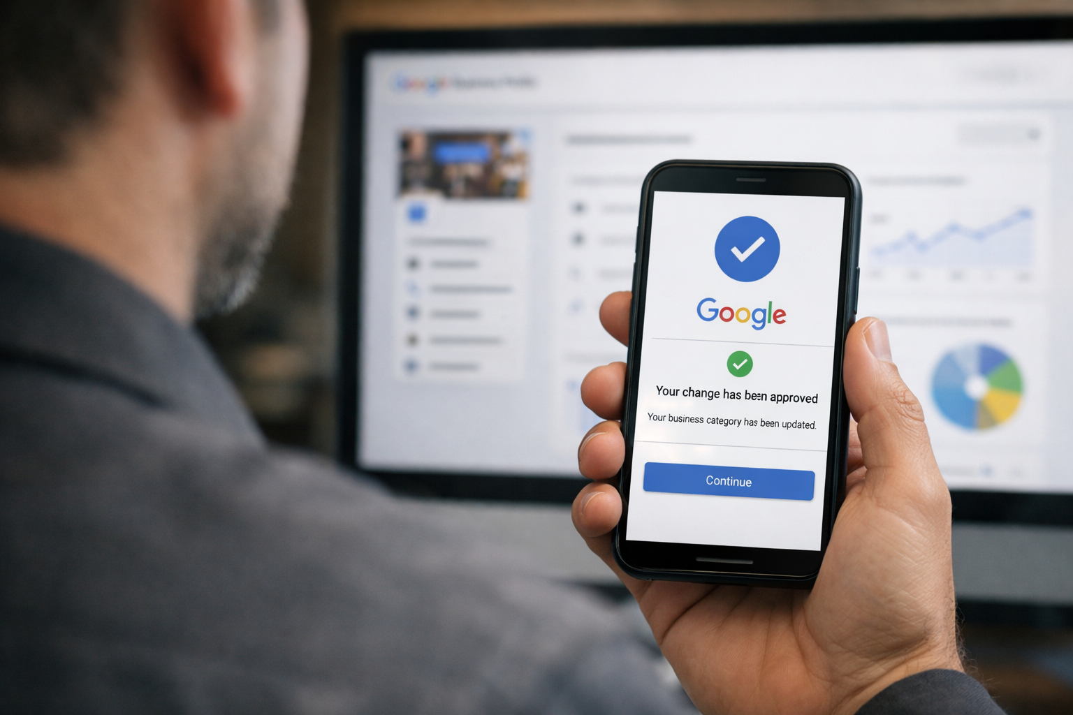 Business owner viewing Google verification on phone for category change.