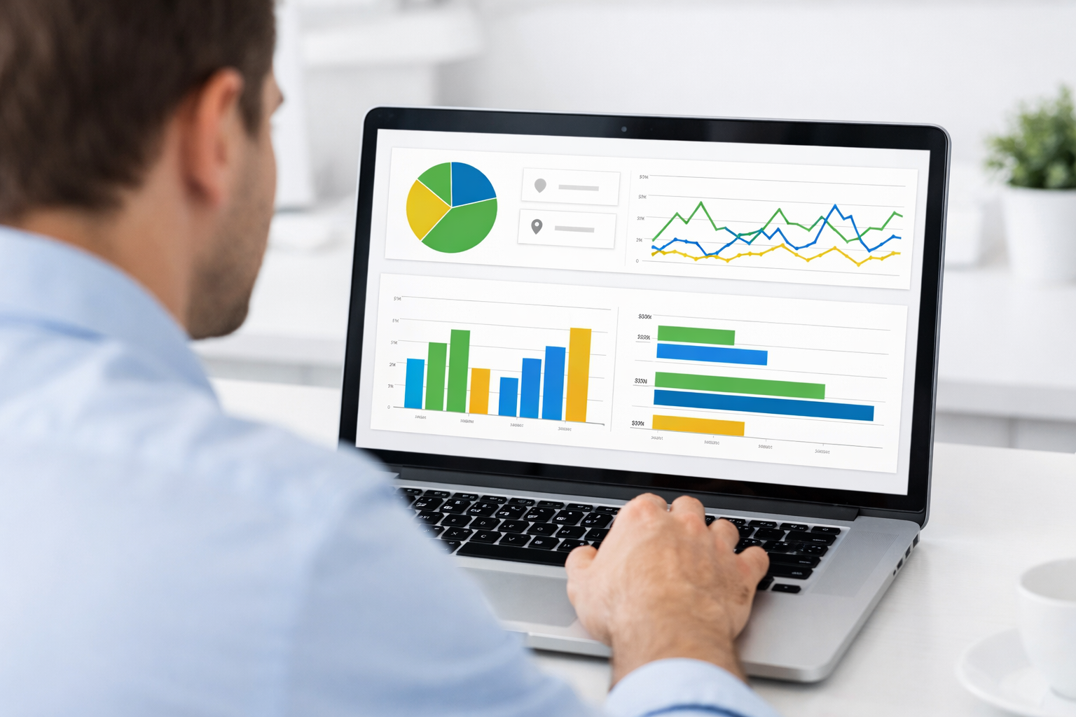 Manager reviewing Google Business Profile insights on laptop.