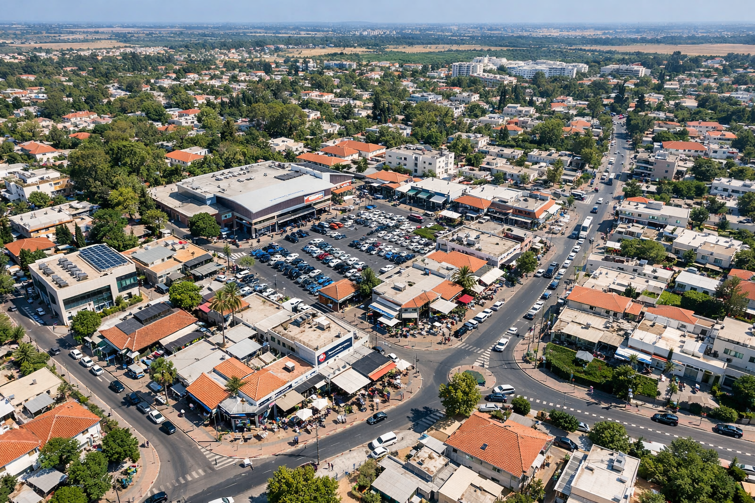Aerial view of Pardes Hana city center showing business proximity.